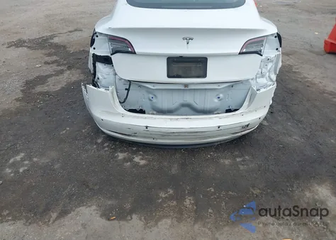 2021 Tesla Model 3 Standard Range Plus Rear-Wheel Drive from USA, damaged, VIN 5YJ3E1EAXMF838243